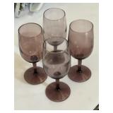 Purple glass stemmed wine glasses