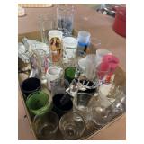 Collection of shot glasses and ash trays