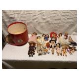 17 small to extra small dolls. Plus red hat box.