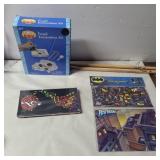 Rockland drum sticks, fossil kit, earbuds and