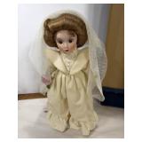 Porcelain Doll on Stand