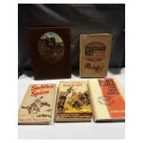 Old western books assorted, saddles and spurs,