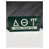 vintage green-and-white novelty license plate