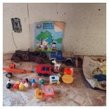 Fisher price figures, Tonka truck, and more