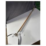 Vintage wooden and metal grabber