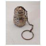 Silver teaball infuser marked Sterling.
