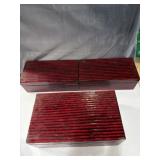 red-and-black striped decorative wooden nesting
