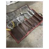 Motorcycle roll up tool pouch with tools