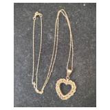 10K necklace w/ heart charm.    .025z