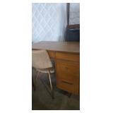 Small wooden desk with chair