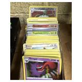 Stack of Pokï¿½mon cards, including holos