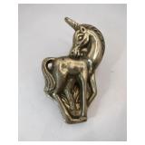 Action brass unicorn clip