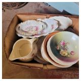 Assorted painted plates and more
