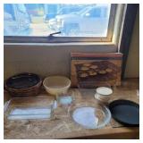 Glass baking dishes, cooling rack and small glass