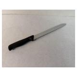 Pampered chef knife 14in with handle and has