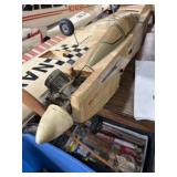 balsa wood remote-controlled (RC) gas airplane