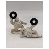 2 modern cast iron Michelin Man