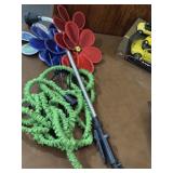Expanding hose w/ watering attachment & flower