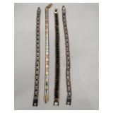 Silver and gold tone bracelets with rhinestones