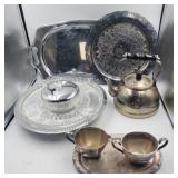 Silverplate serving dishes and teapot