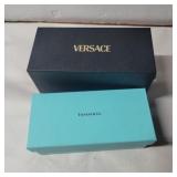 Empty Versace and Tiffany boxes