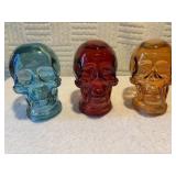 Three skeletons heads