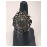 Silver poison ring green stone Marked 925