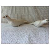 Two ceramic ivory cream doves stamped 83 on the