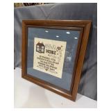 Cross-stitch sampler featuring a