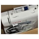 Singer sewing machine gently used in original box