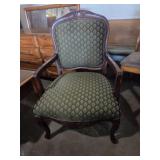 Ornate wooden armed lounge chair