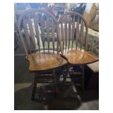 Matching swivel wooden bar stools with backs