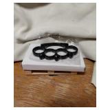 New In Box All Black Brass KnucklesWith Skulls