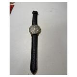 Geneva gold-tone quartz wristwatch featuring a