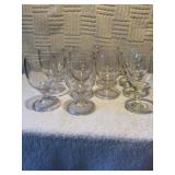 Eight clear water goblets 5 1/2 x 3. Three clear