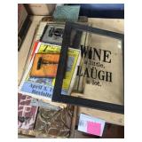 Variety of wall art, metal, old programs. and