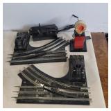 Lionel track and railroad crossing light and