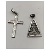 2 silver charms marked Sterling  .090oz
