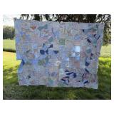 Quilted bedspread has damage very used.