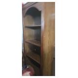 Wooden bookcase with water damage
