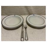 Two Navy bowls and US military silverware.