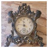 Waterbury metal clock missing 1 leg 5in tall