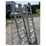 2 six foot aluminum step ladders