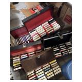Cases of 8-tracks, cassettes, and vhs tapes