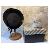 Two vintage hats, and one hat box.