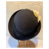 Two ladies, black hats
