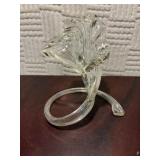 5 1/2 inches tall blown clear glass flower.