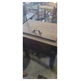 Wooden ice chest with cast iron handle