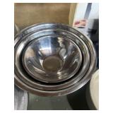 Three stainless mixing bowls