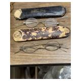 Two pairs of old reading glasses